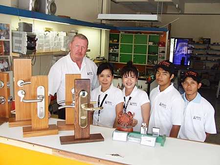 Timo Viljanen, left, is seen with his team of locksmith professionals, May, Au, Mos and Aed.